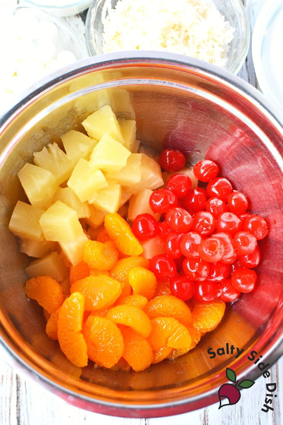 fluff salad in a bowl with fresh fruit.