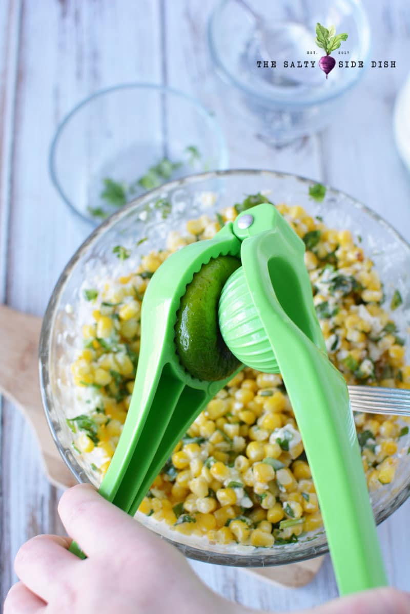 lime squeezer putting fresh lime into the bowl