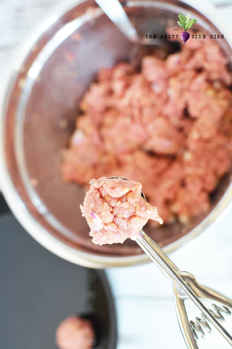 make a meatball with a 1 tablespoon scoop for perfectly proportioned meatballs