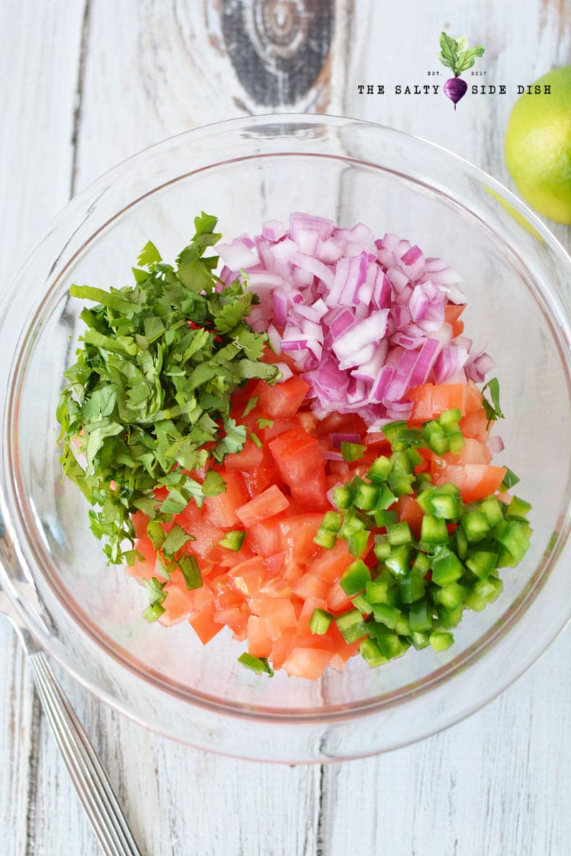 how to make pico de gallo with fresh homemade and simple ingredients all sitting in a bowl ready to be mixed