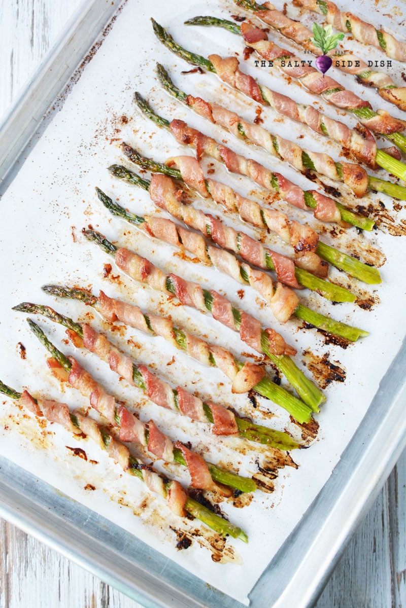 bacon wrapped asparagus on a plate