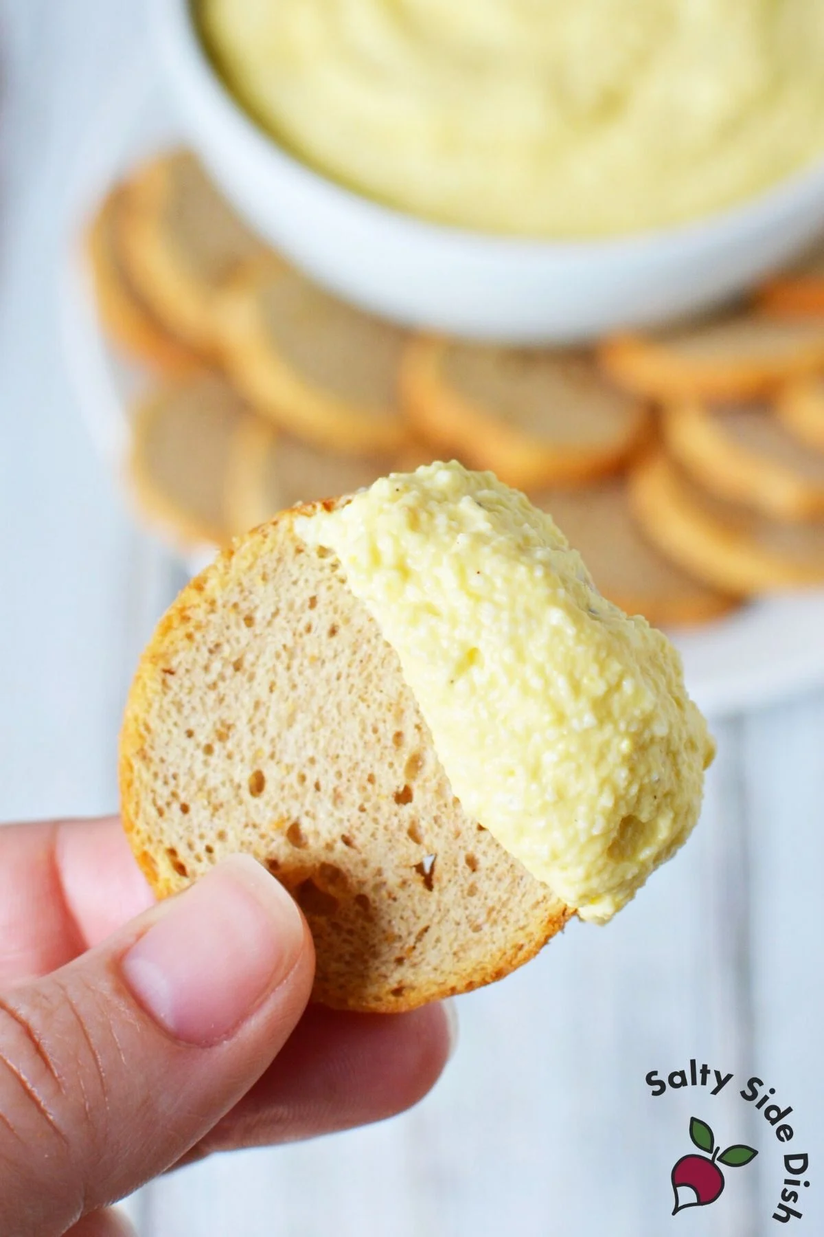 deviled egg dip on melba toast.