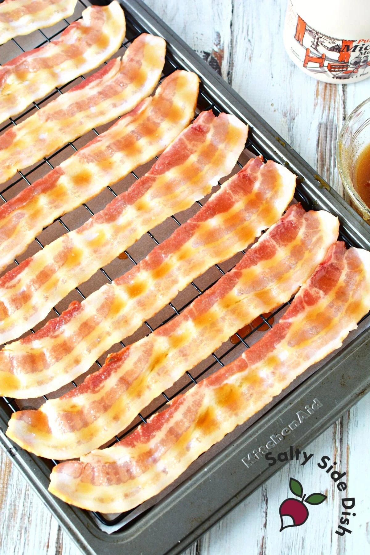 pieces of glazed bacon on wire rack.