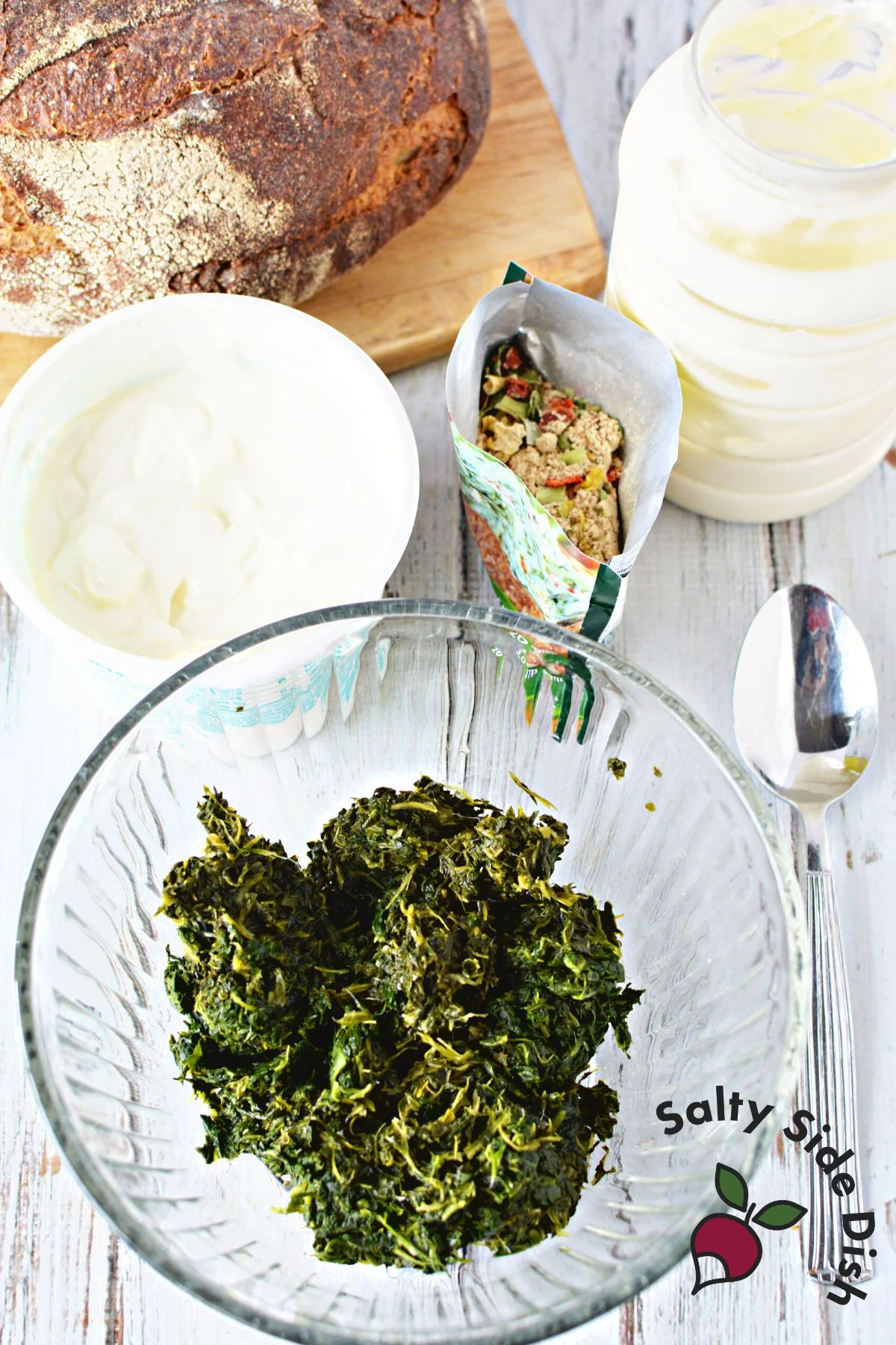 spinach dip ingredients on a table.