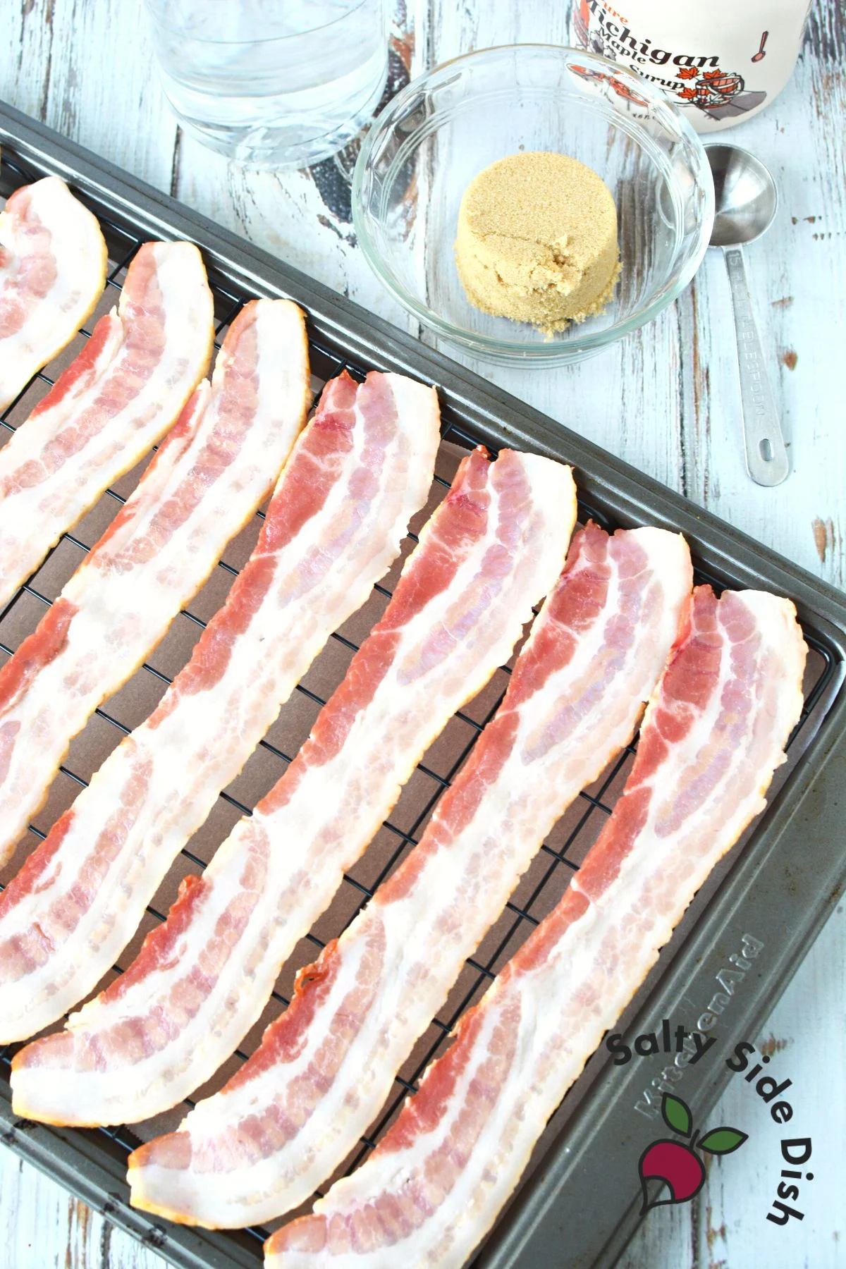 step 1 is arranging bacon in a layer on wire wrack as shown.