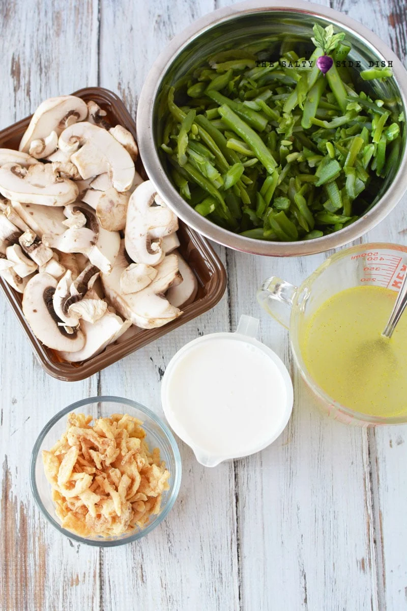 green bean casserole recipe with ingredients, mushrooms, green beans, french fried onions on the side
