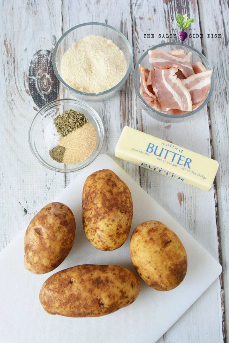 hasselback potato ingredients with butter, seasoning and bacon