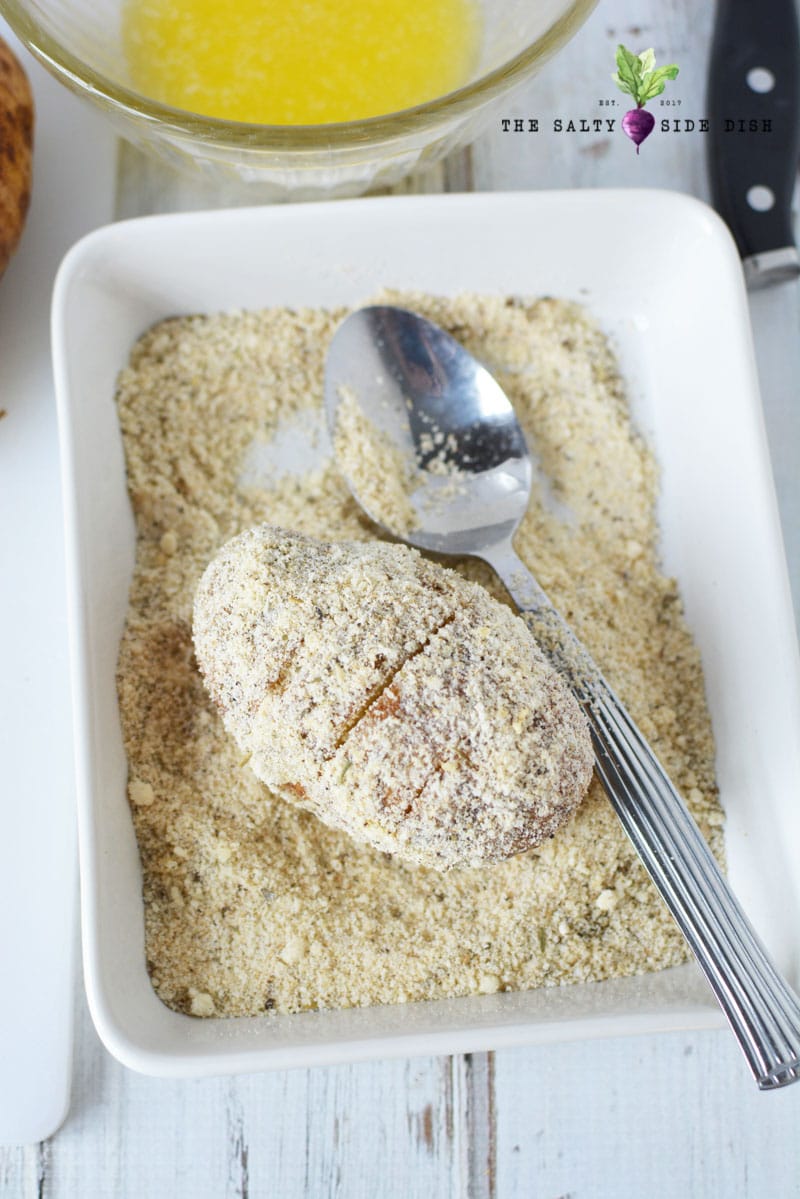 scooped Parmesan cheese over prepped potato
