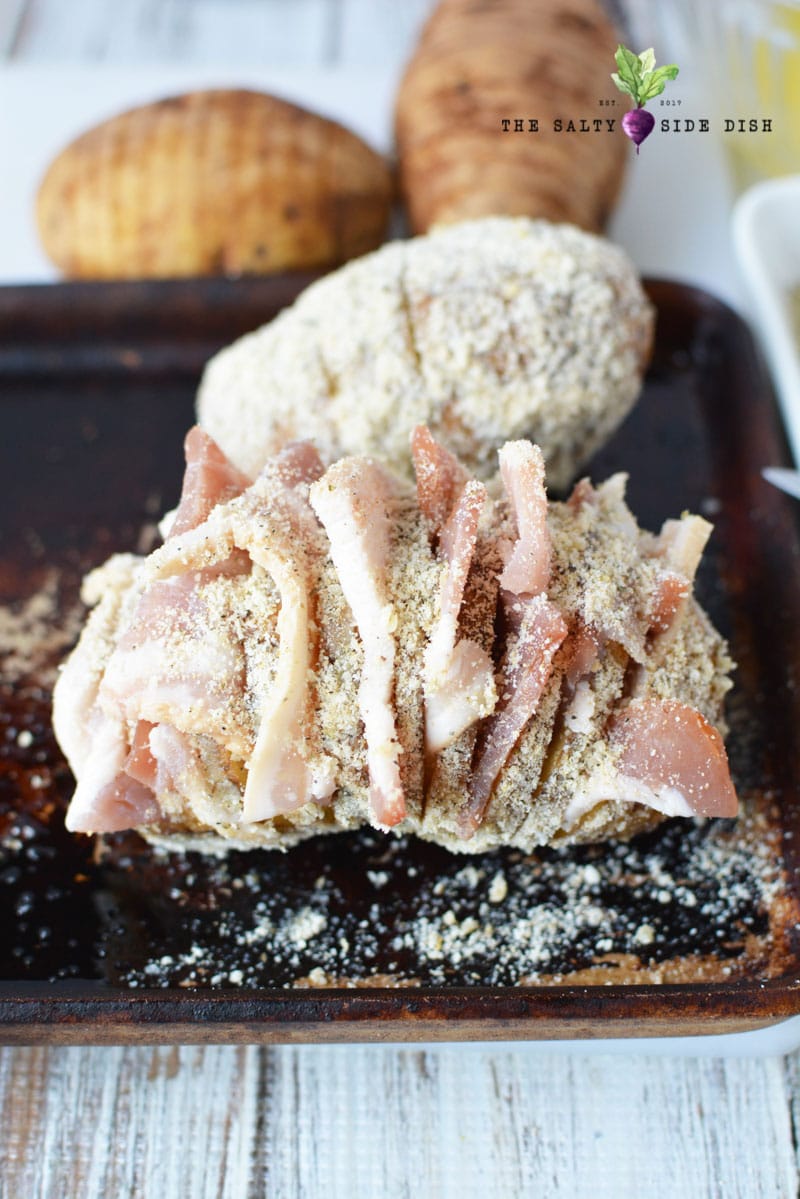 how to cut a hasselback potato with bacon and set on a sheet pan