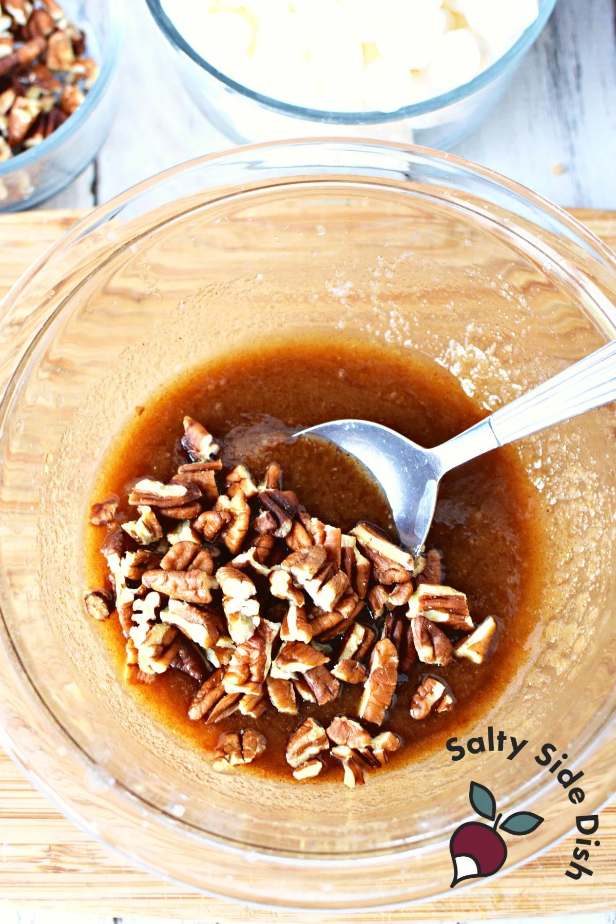 brown sugar, butter and pecans in a bowl.