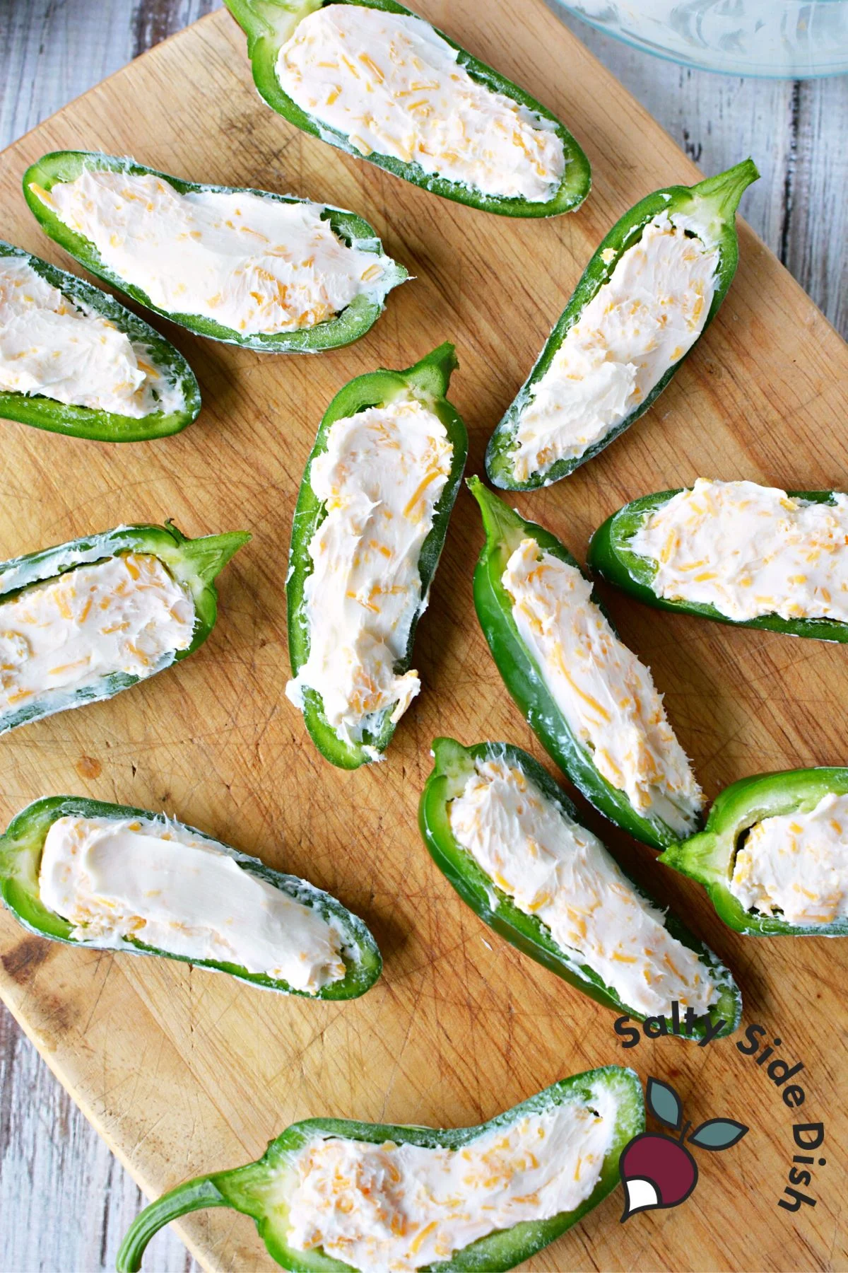 jalapenos on a cutting board.
