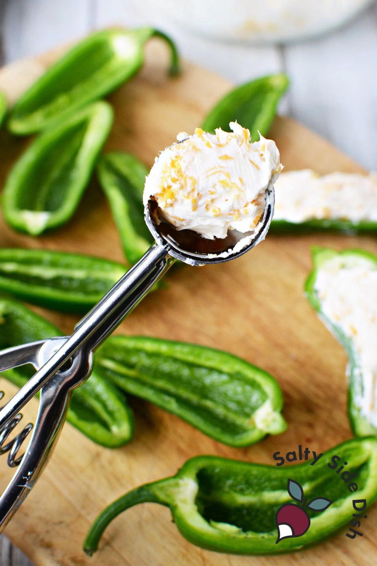 use a tablespoon scoop to grab philadelphia cream cheese mixture.