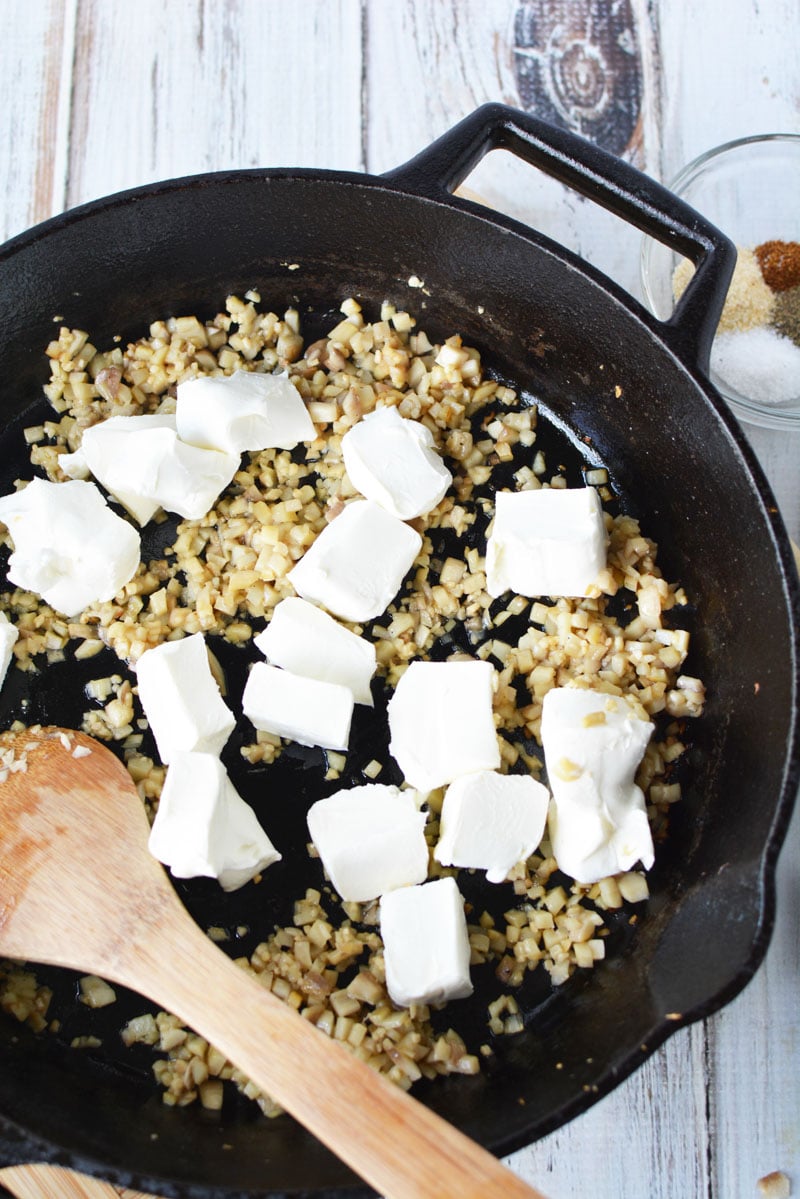 easy stuffed mushrooms - just add pieces and cream cheese to cast iron pan