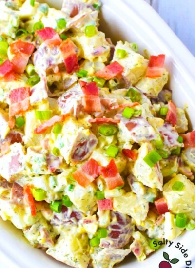 Red Potato Salad in a white bowl.