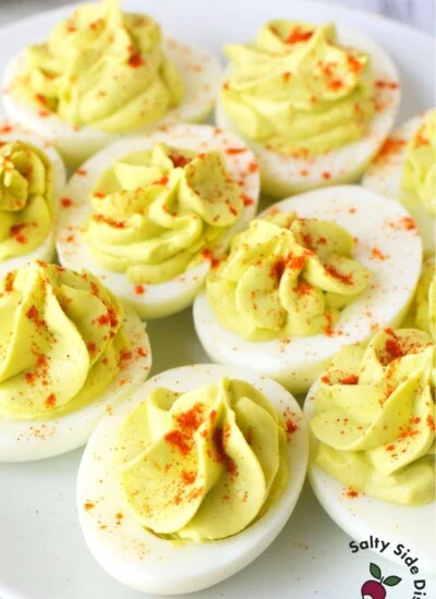 avocado deviled eggs with paprika topping