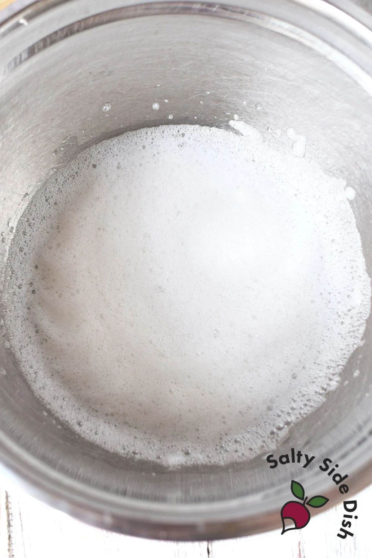 whipped egg whites in a bowl.