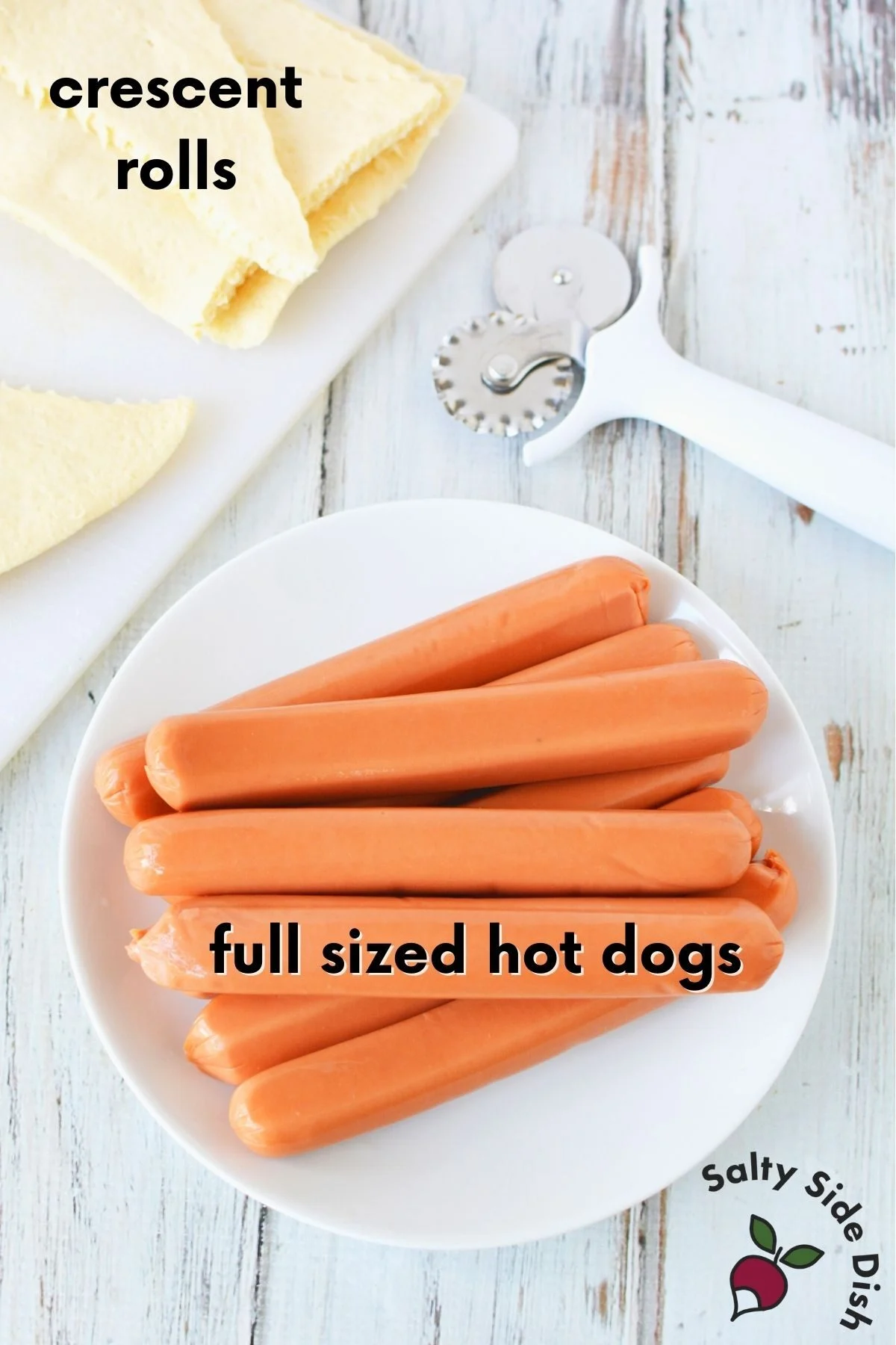 2 ingredients for a hot dog mummy recipe on a white plate.