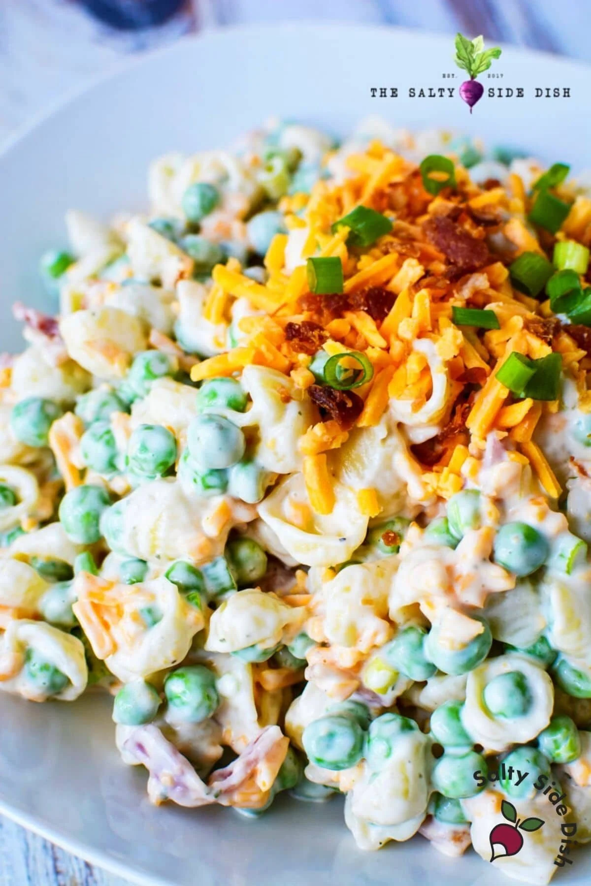 pea pasta salad piled high on a plate