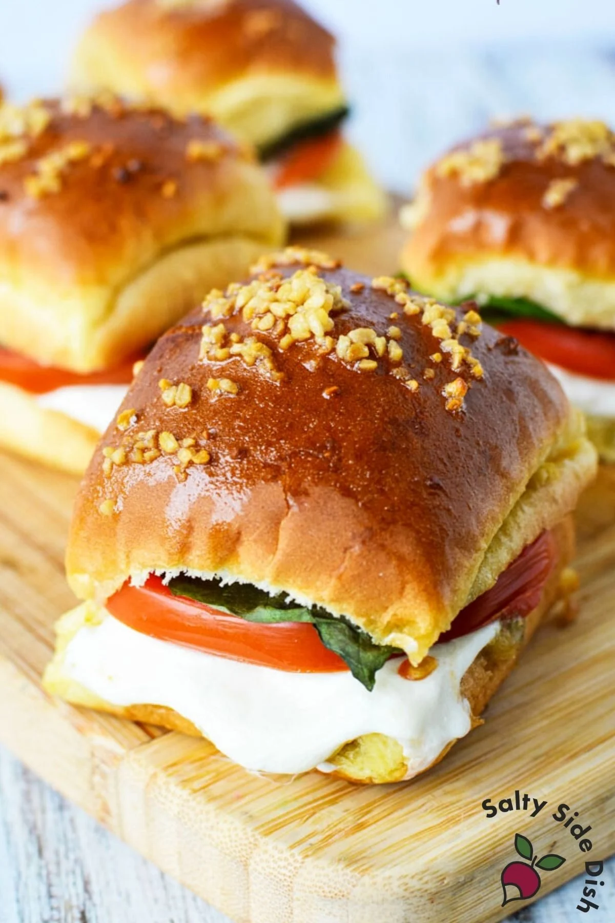 Hawaiian Kings roll with tomatoes, basil and mozzarella cheese.