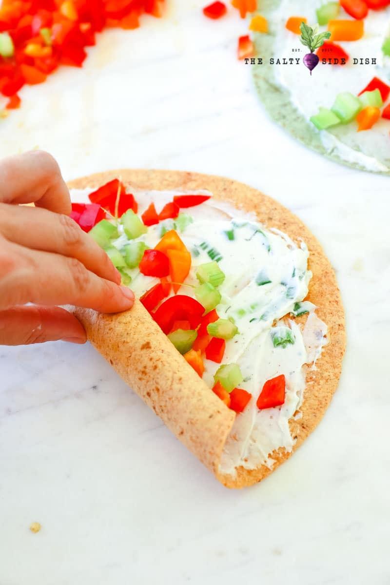 roll up your tortillas tightly so they can be compact in a finger food