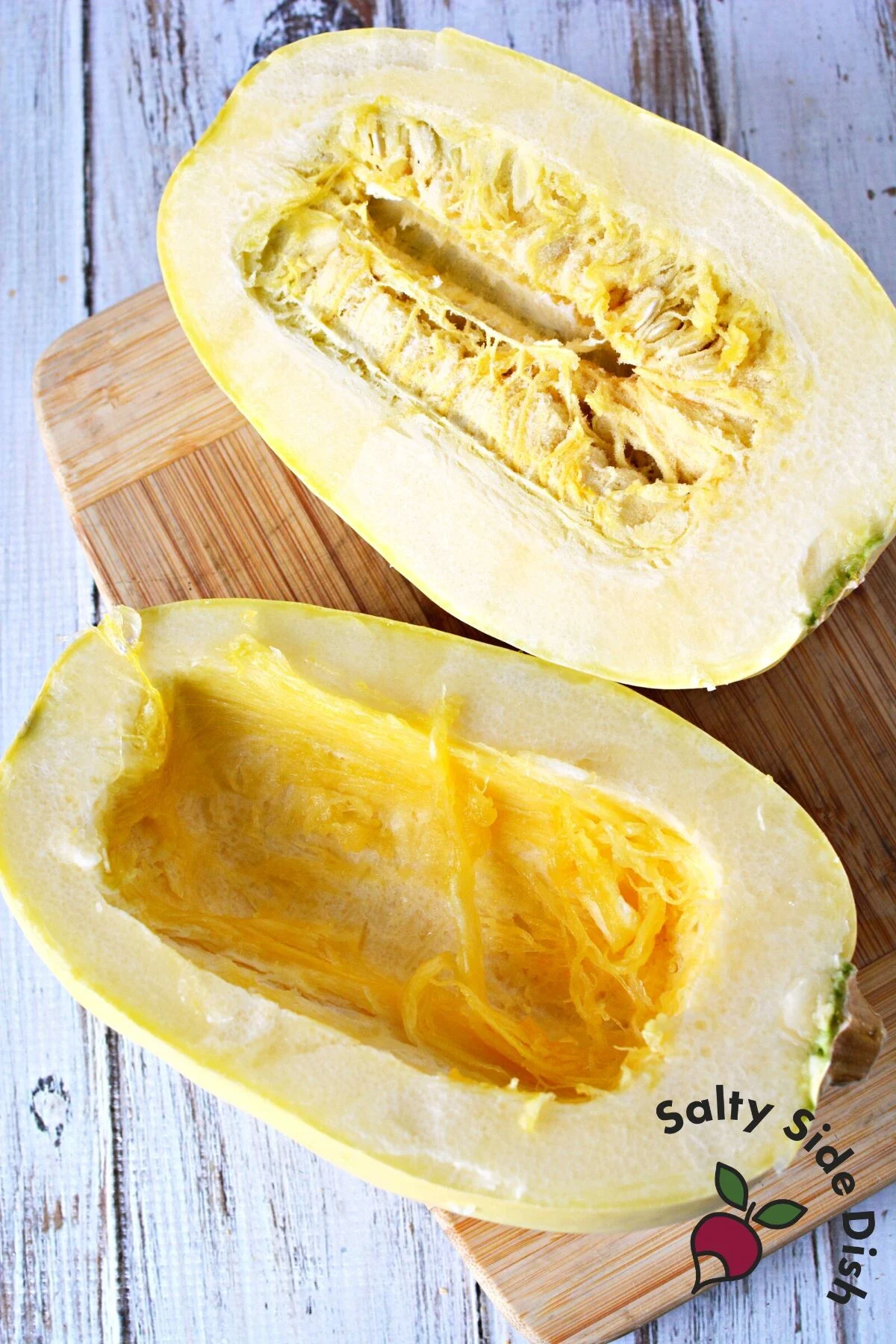 cutting spaghetti squash in half.