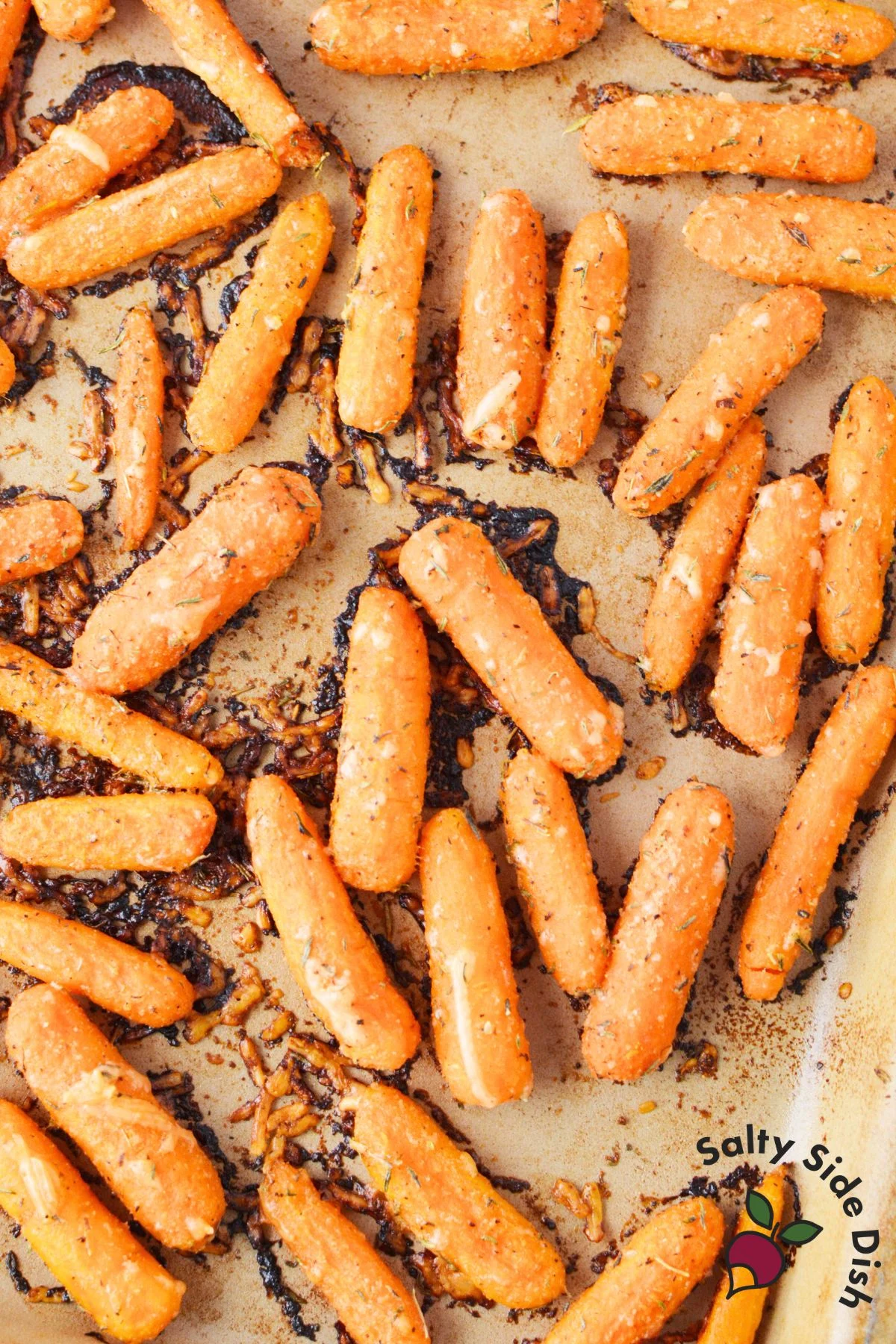 oven roasted baby carrots with parmesan cheese baked until golden and slightly crisp
