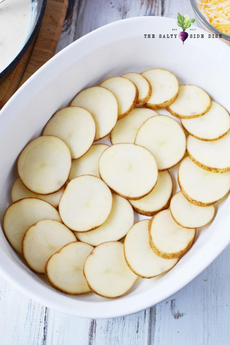 slicing scalloped potatoes