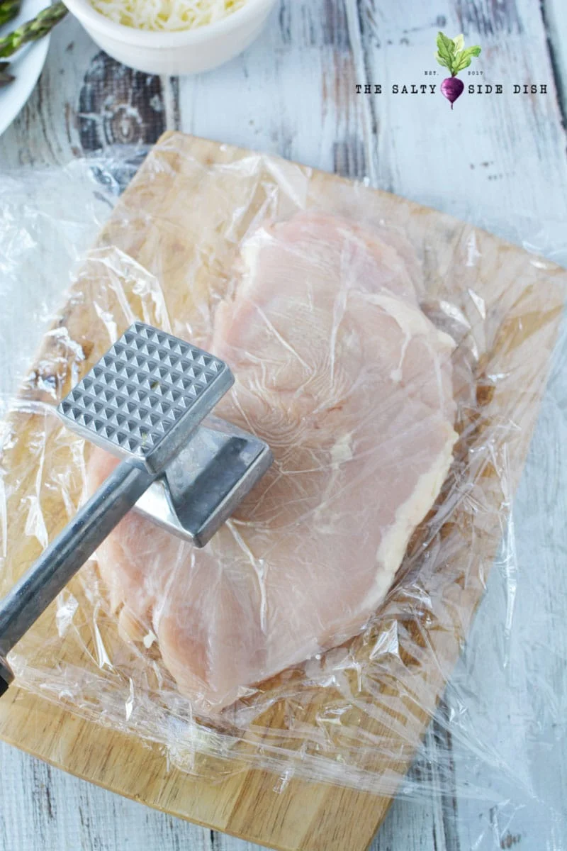 pound chicken flat with a mallet