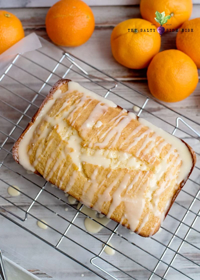 pour orange glaze over cooled orange bread