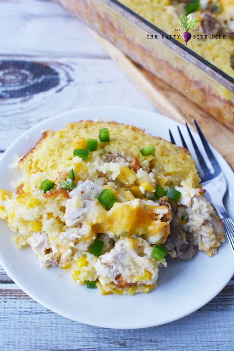 chicken mexican corn bake on a plate with creamy corn and mushrooms