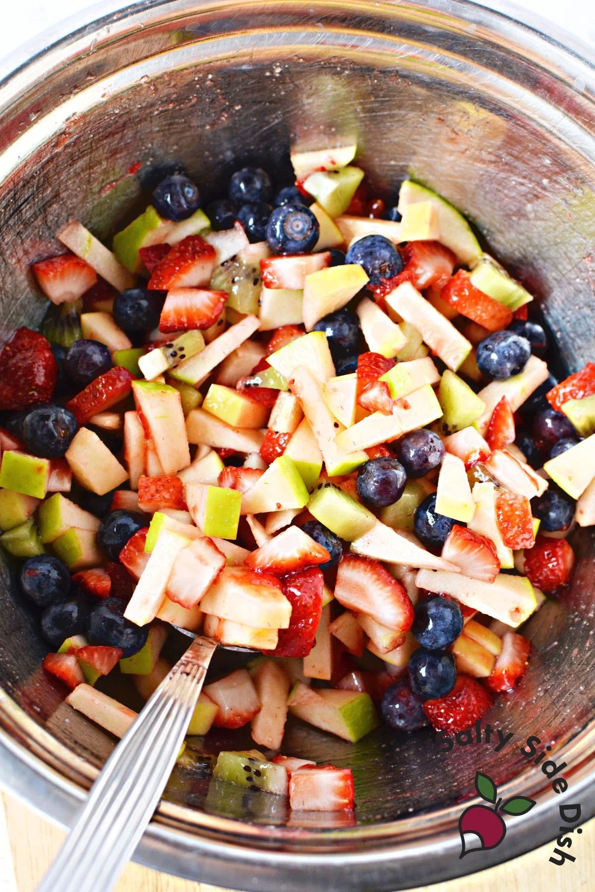 all fruits in a mixing bowl