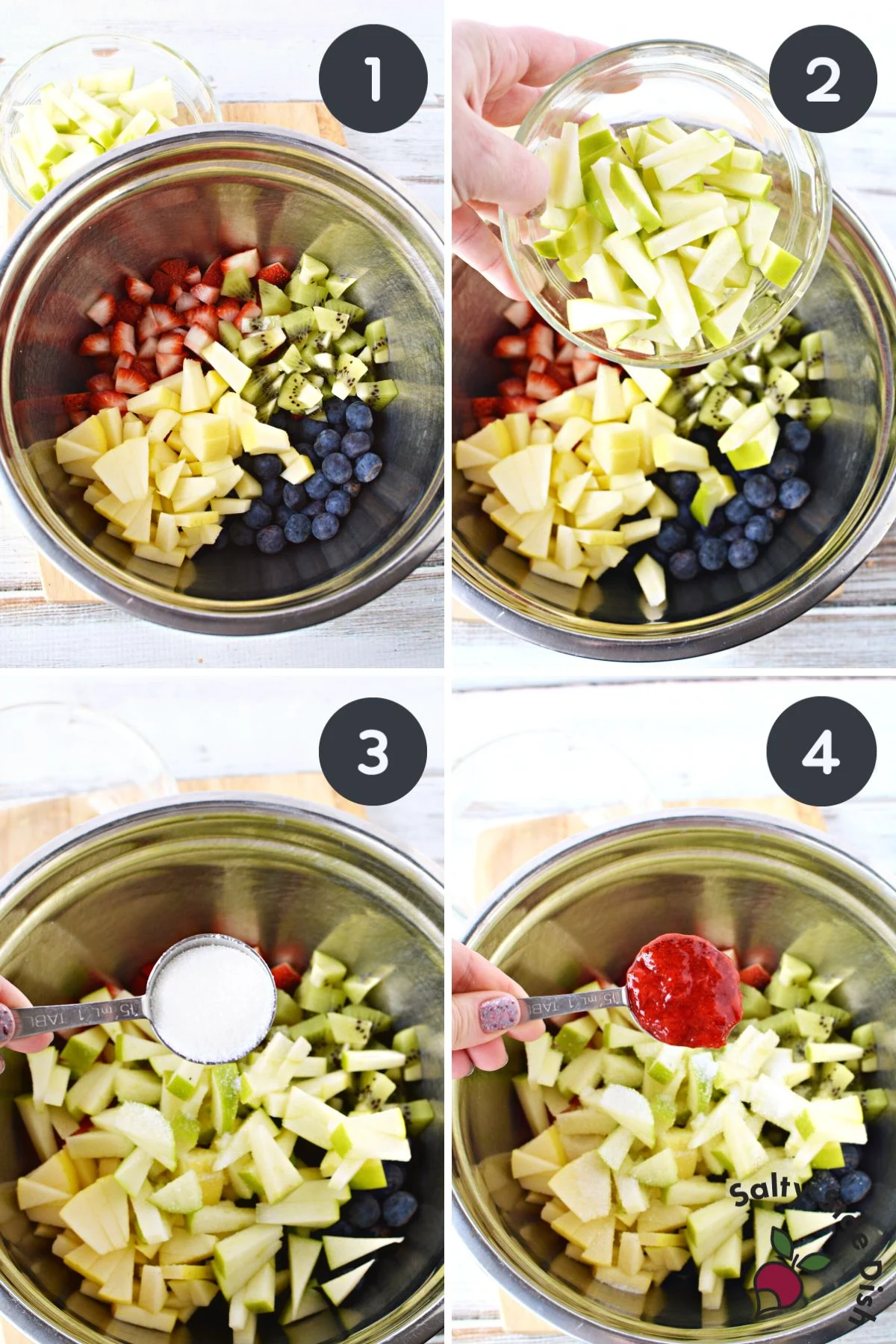 adding cut up fruit to the mixing bowl.