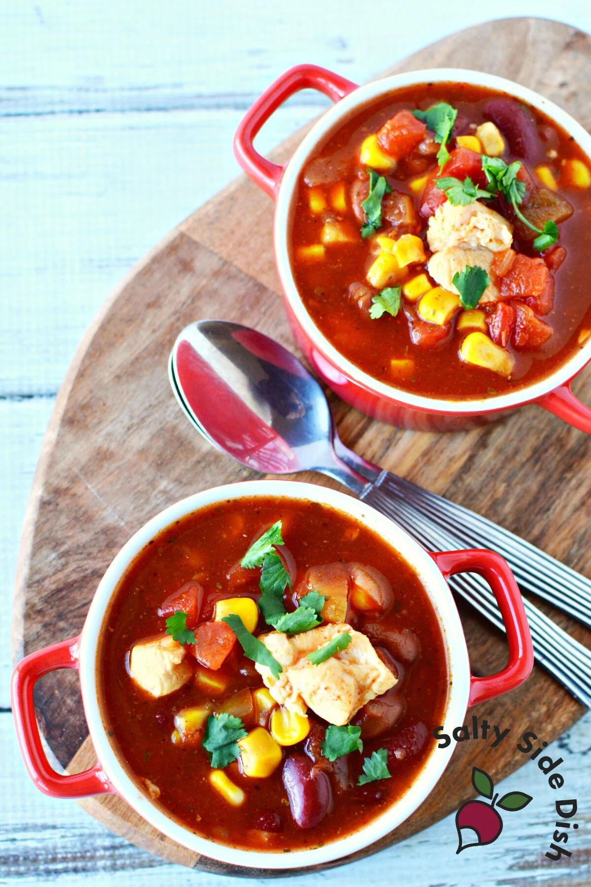 two bowls of mexican chili ready to eat.