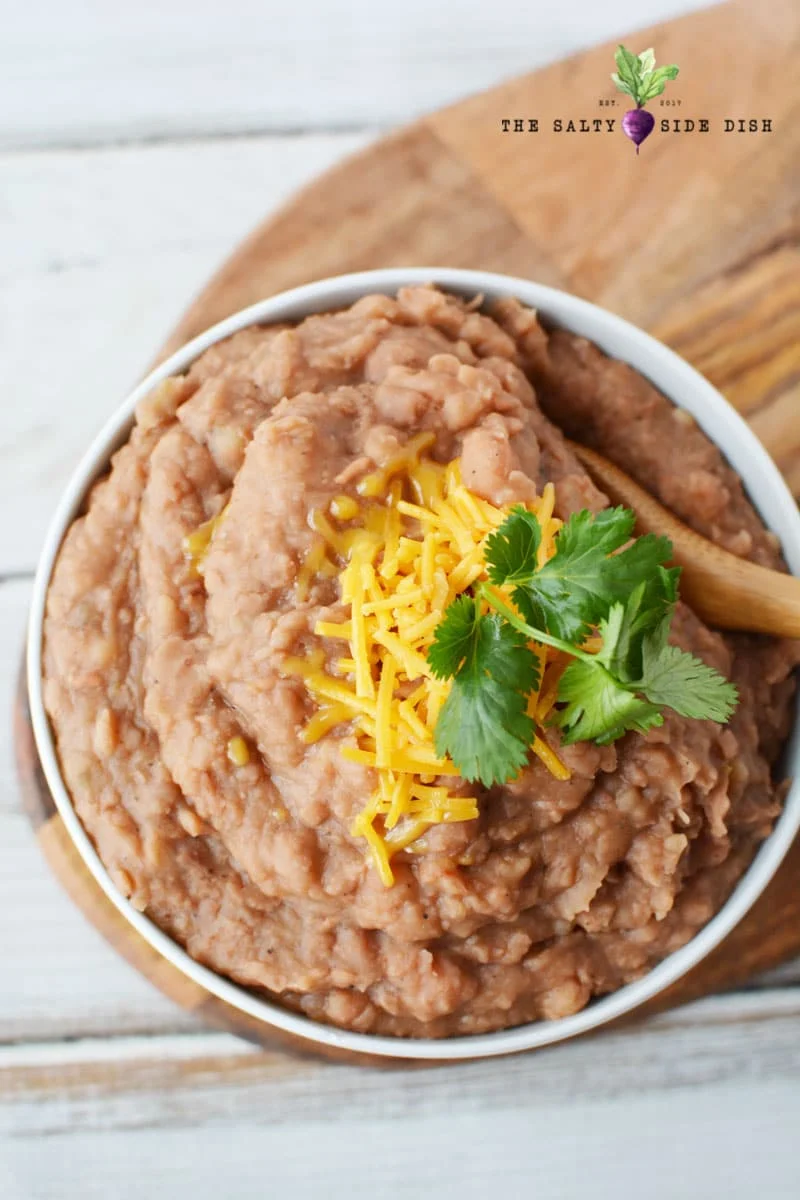 Slow Cooker Refried Beans are a flavor-filled Mexican Side Dish that you never knew was SO easy to make