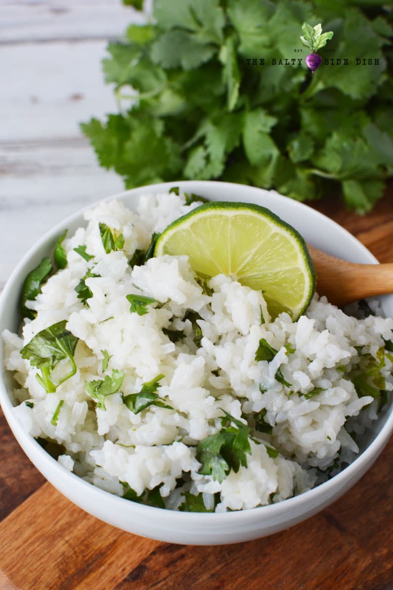 chipotle cilantro lime rice with fresh lime in a bowl