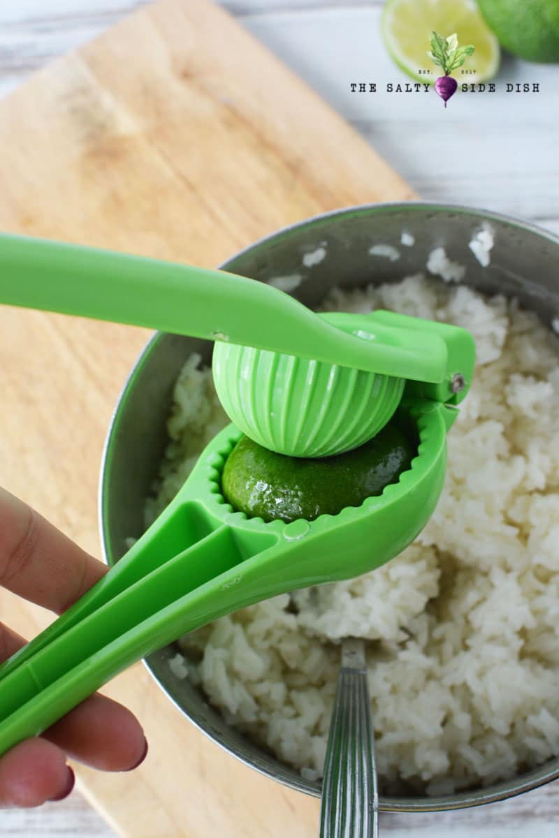 squeeze in fresh lime with squeezer for delicious flavor