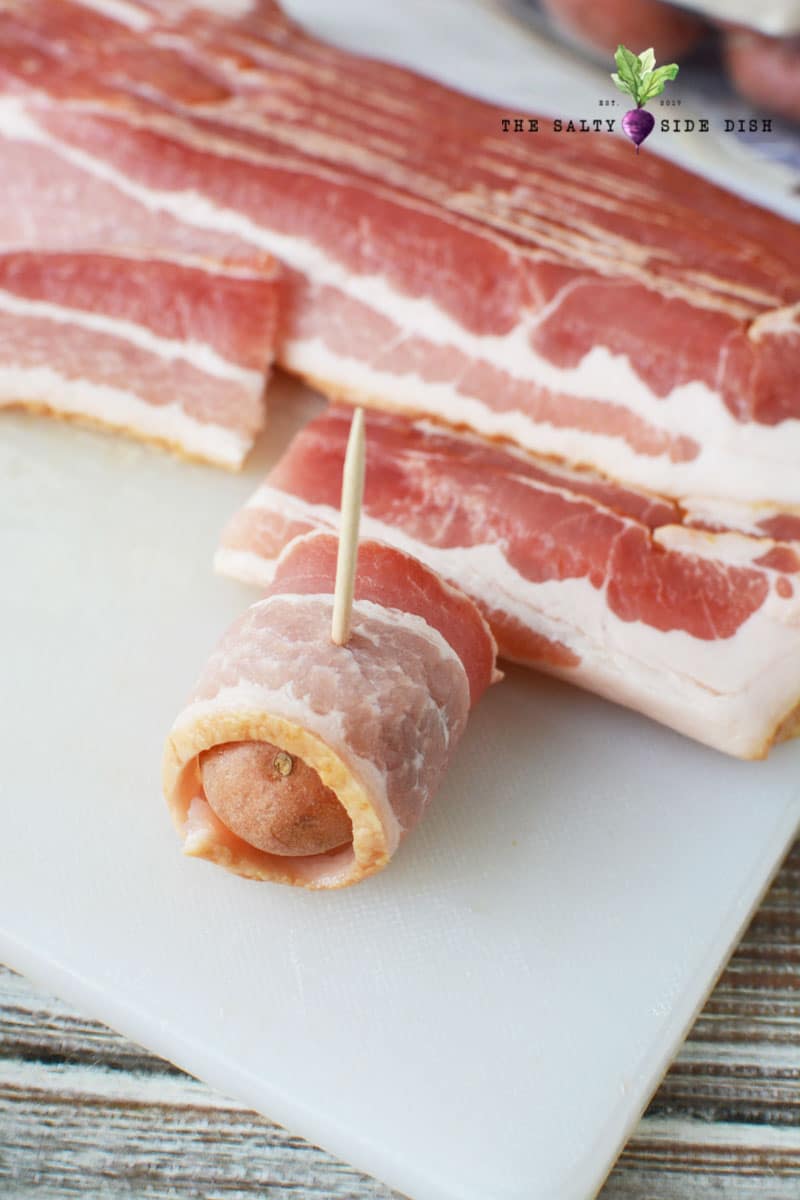 use toothpick to hold bacon in place of your bacon wrapped potato