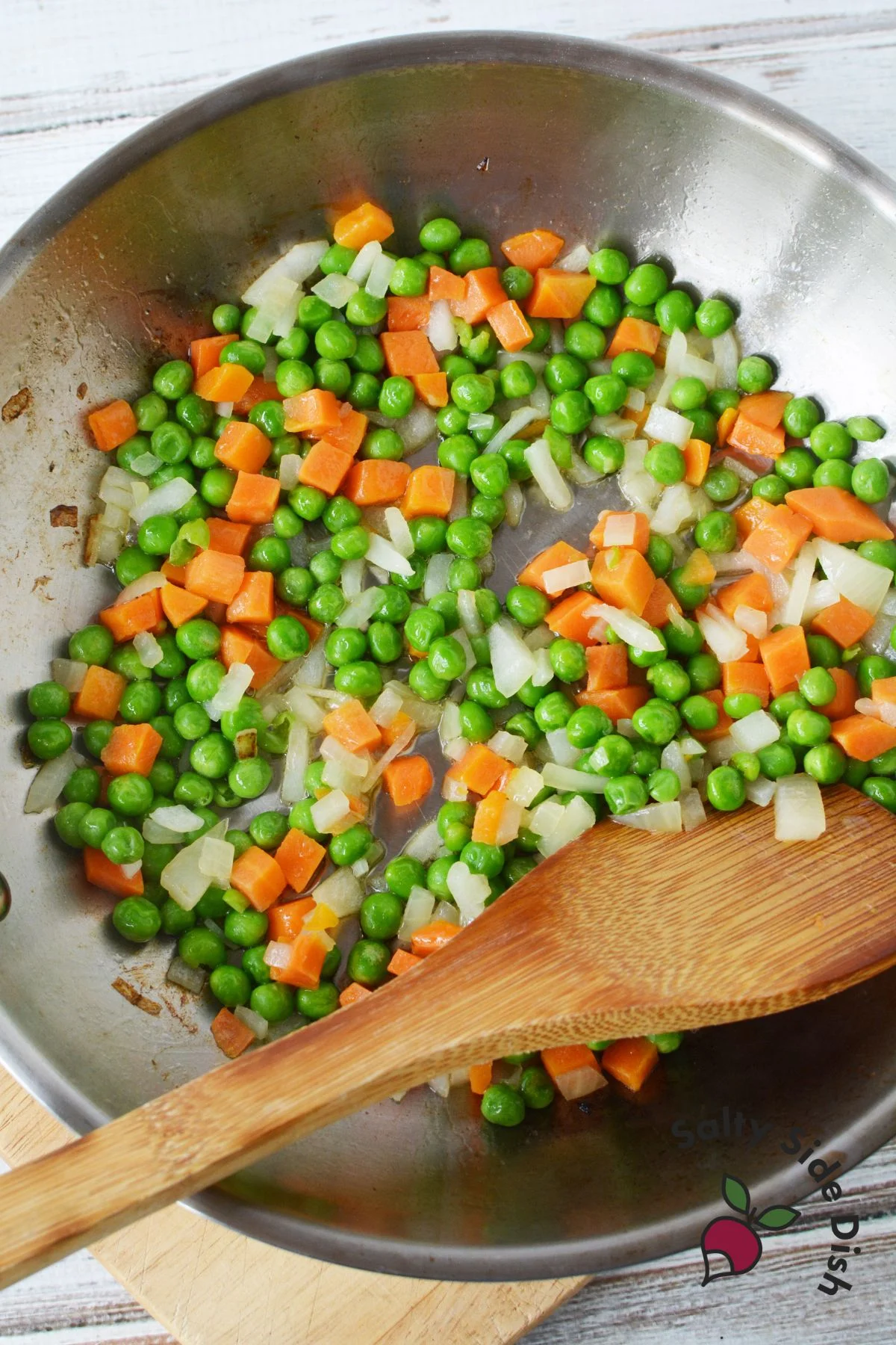 diced up peas, carrots, and onions with garlic.