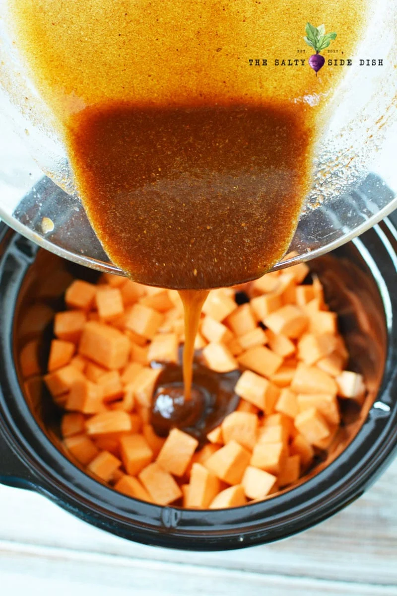pour your sticky sweet topping into your chunks of sweet potatoes in the crockpot