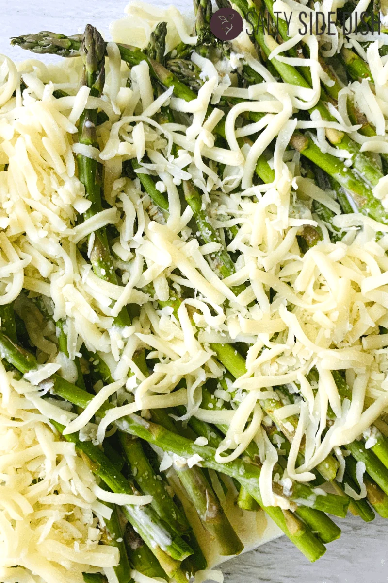 asparagus covered in mozzarella and Parmesan cheese