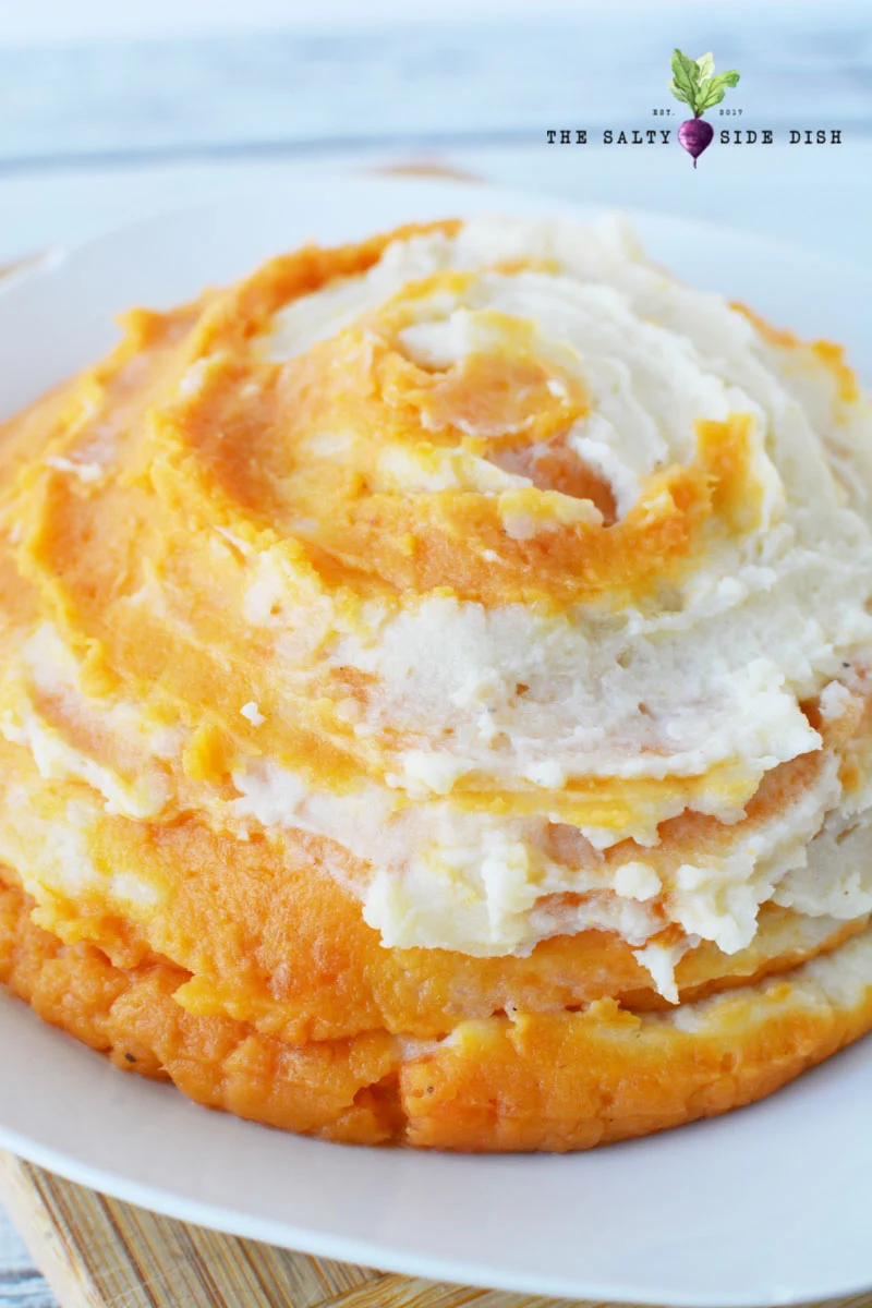 mixed potato side dish perfect for Thanksgiving and served on a white plate