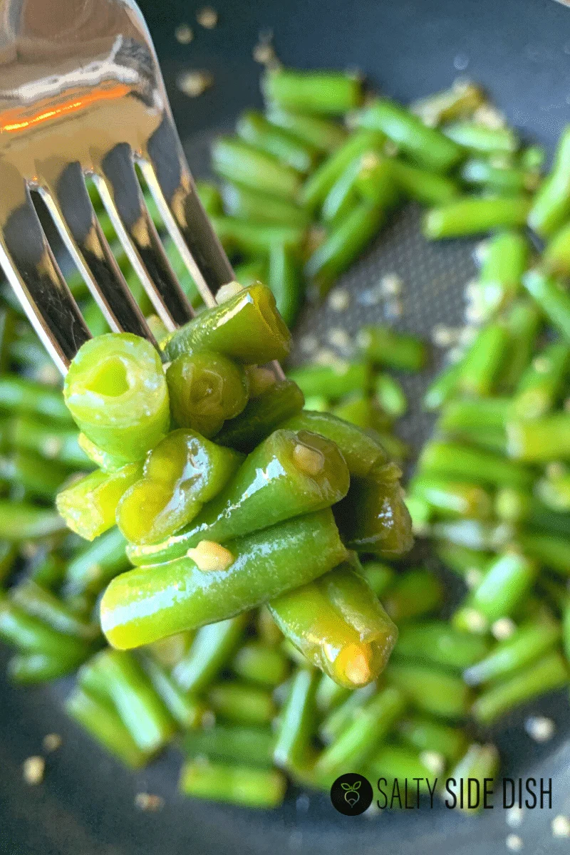 easy keto friendly green beans on a fork