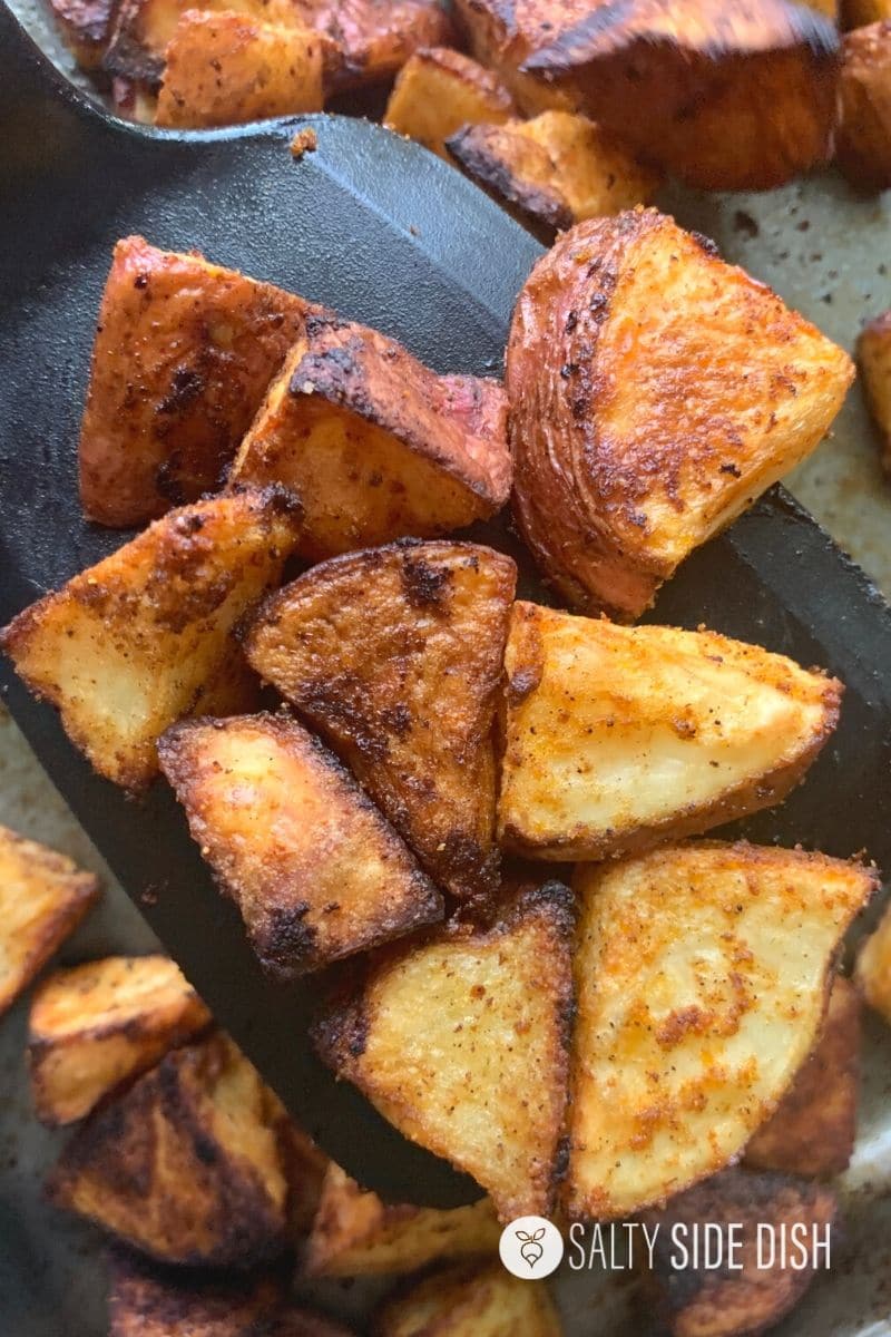 Roasted Breakfast Potatoes done and on spatula ready to serve
