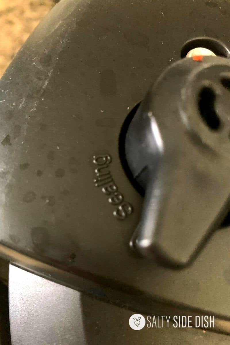 move pressure cooker to sealing