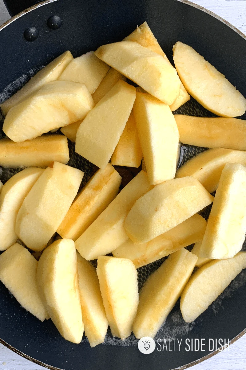 Apple slices in a skillet