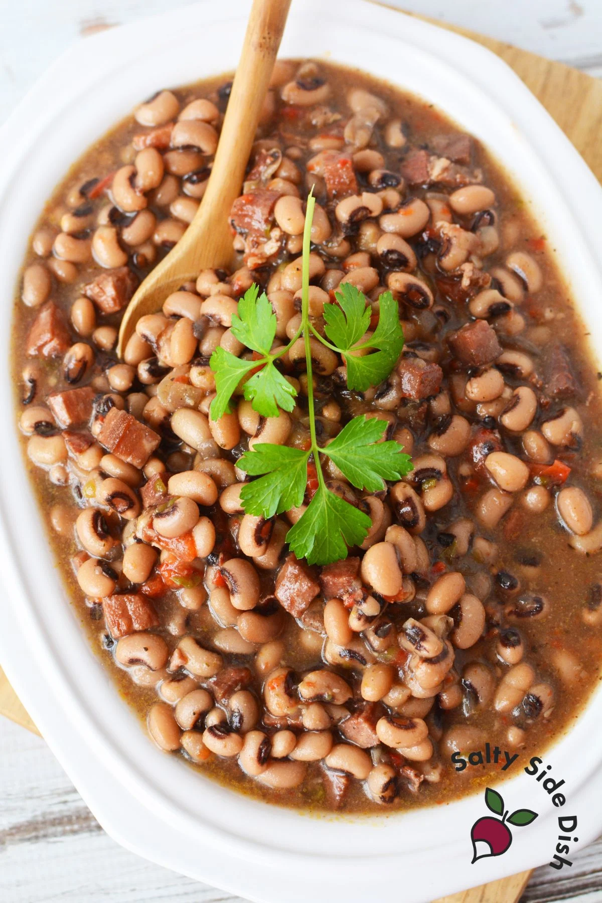 slow cooked black eyed peas in a serving dish.