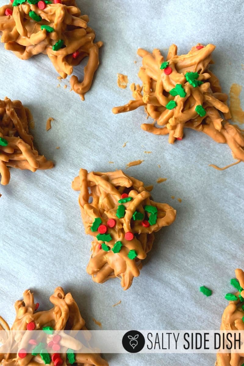 Haystack Cookies with Peanut Butter on parchment paper ready to serve and already set