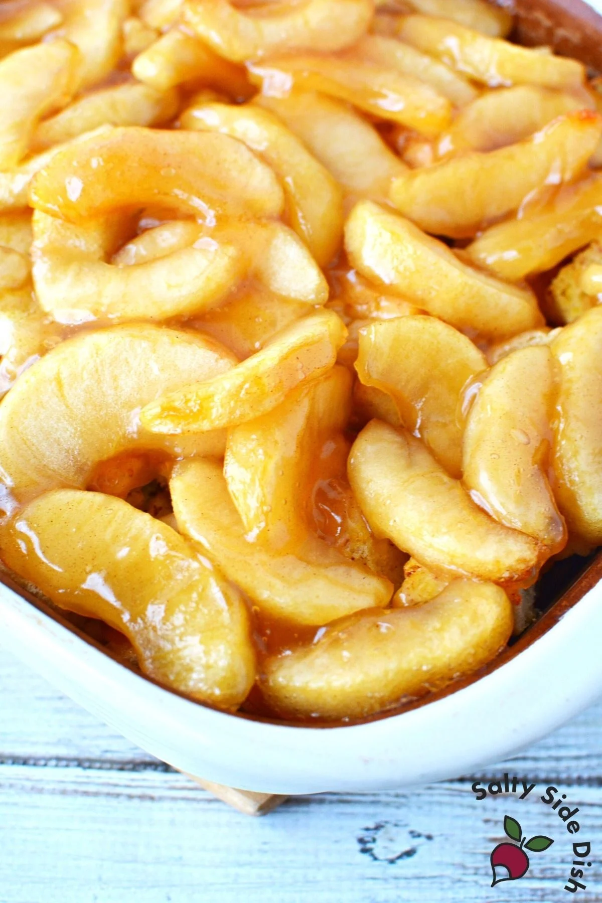 apple pie breakfast bake in a white casserole dish.