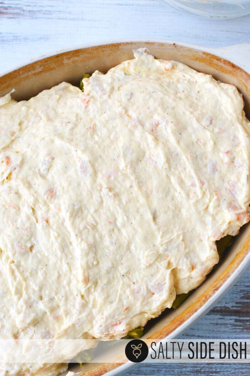 a spatula makes for an easy cheesy coating on top of your asparagus