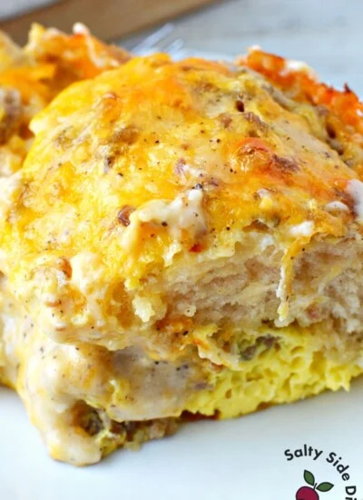 biscuits and gravy casserole on a plate ready to eat for breakfast.
